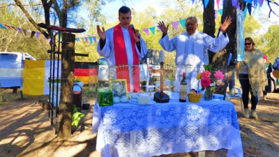 Castelli reconoció la labor pastoral del reverendo padre Holzer