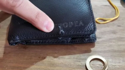 Milagro en Córdoba: una moneda de dos pesos le salvó la vida en un robo