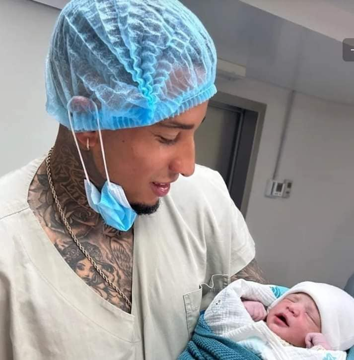 Juan Izquierdo con bebe.jpg