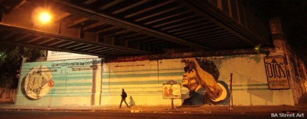 21.- Mural de Mano de D10s en Palermo.