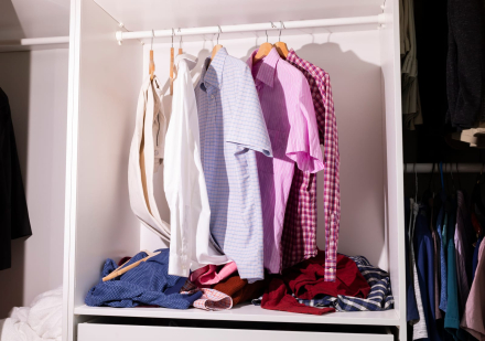 56423138_messy-closet-wardrobe-with-dangling-unfolded-mans-clothes-scattered-things-shirts-on-hangers-junk-drawer-clean-that-mess-concept-organize-your-dresser-solutions-horizontal-plane.jpg