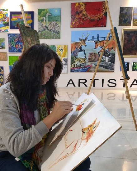 Pintando en vivo en Shopping Sarmiento.jpg